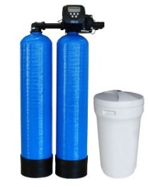 Automatic water softener system with twin resin tanks